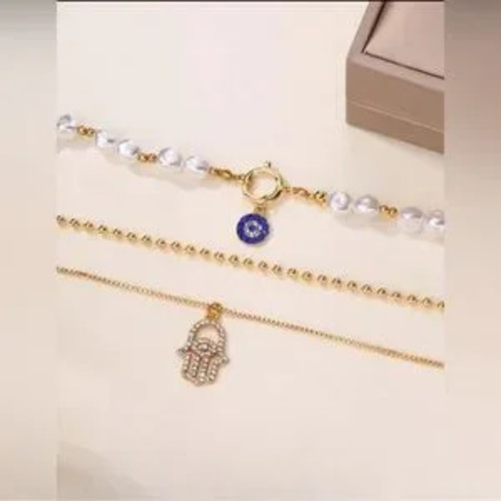 Gold Faux 1pc Pearl Layered Hamsa Hand Necklace w Evil Eye Charm - Picture 2 of 2